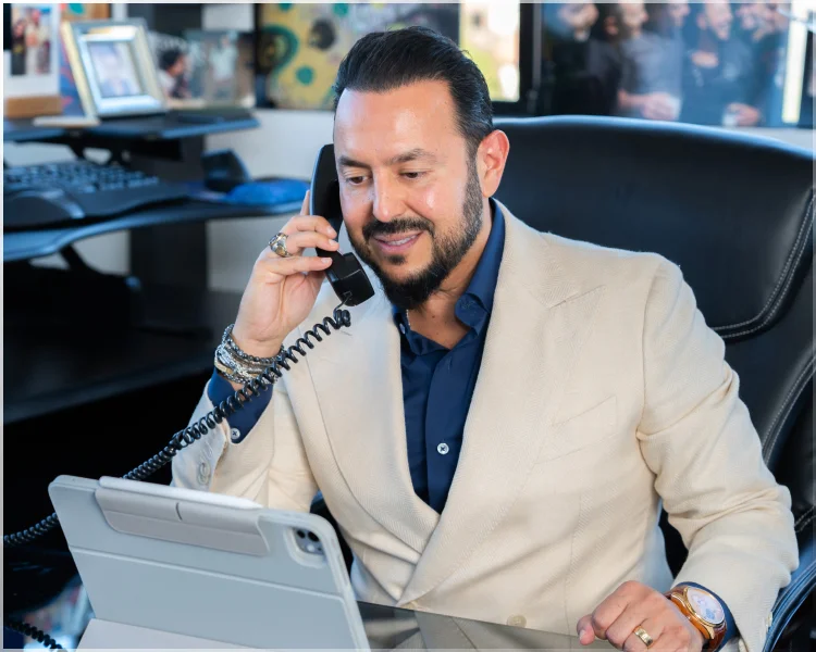 Alex tofer talking on phone